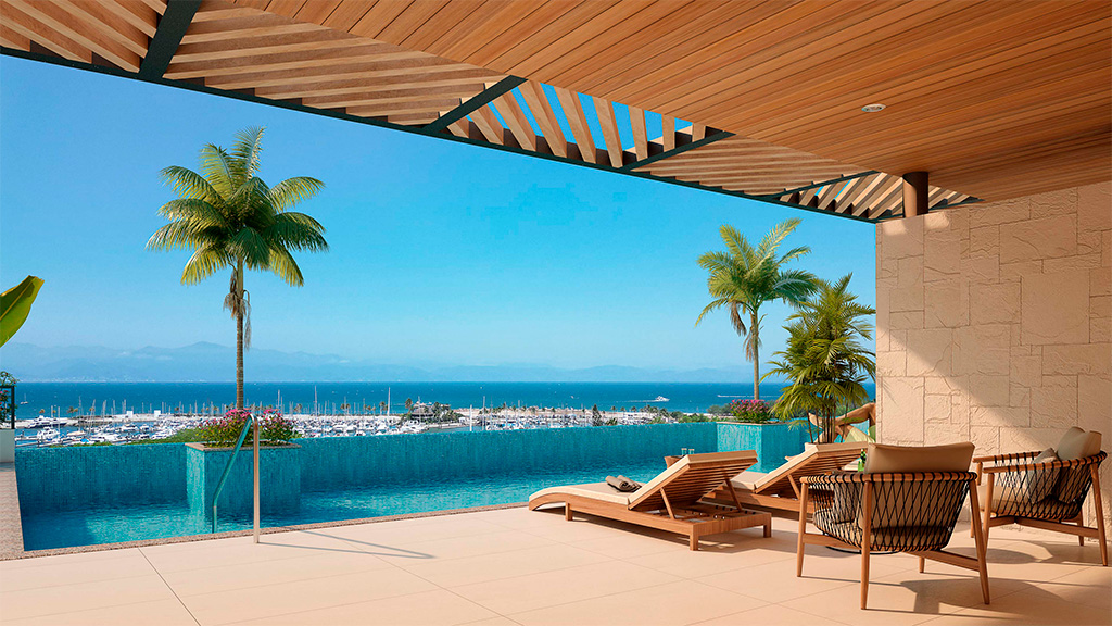 A stunning outdoor infinity pool, with a view of a marina filled with boats surrounded by swaying palm trees against the backdrop of a cloudless sky.